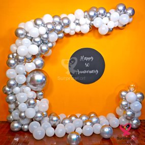 Pearl White Anniversary Arch Decor